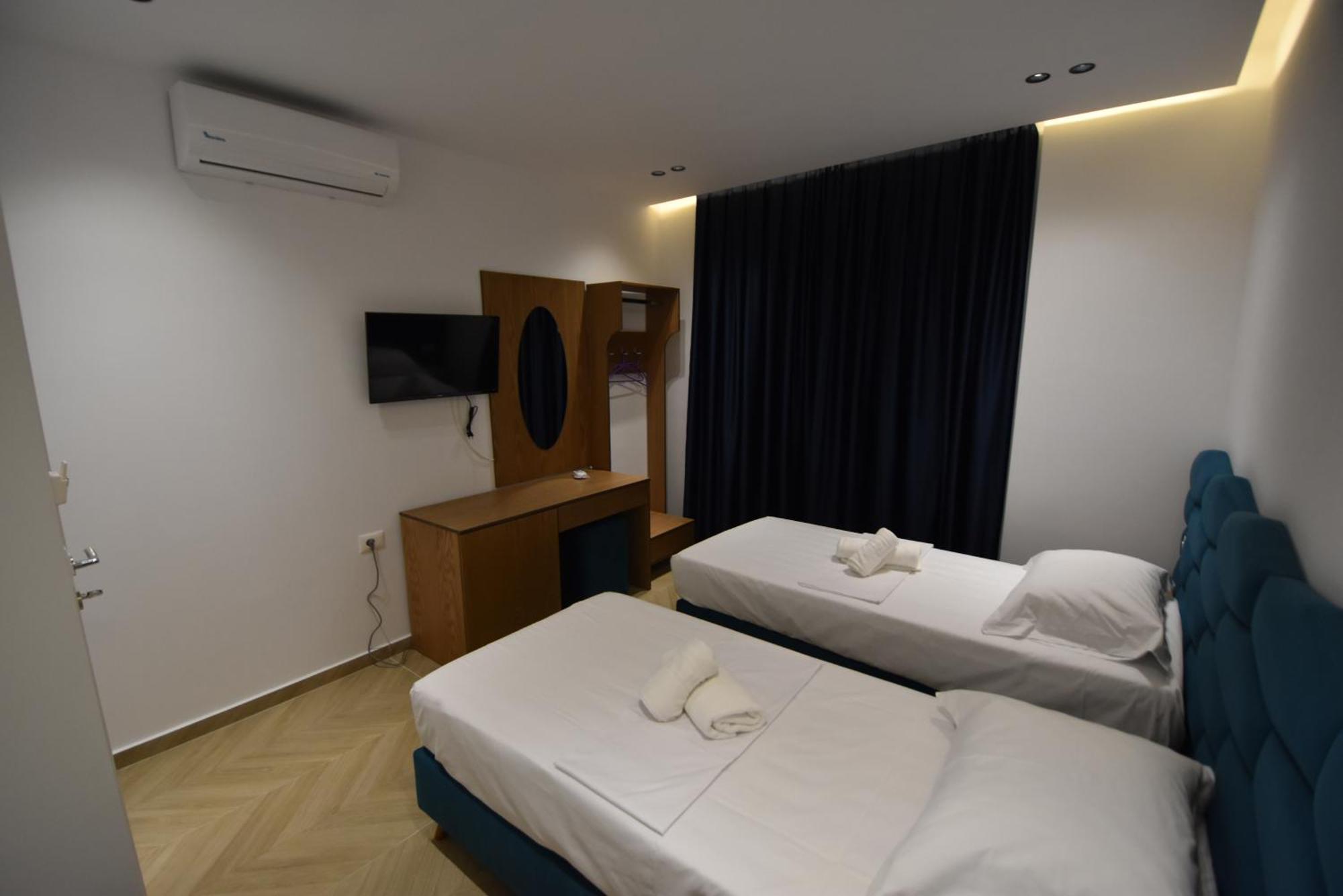 Agimi Hotel Ксамил Екстериор снимка